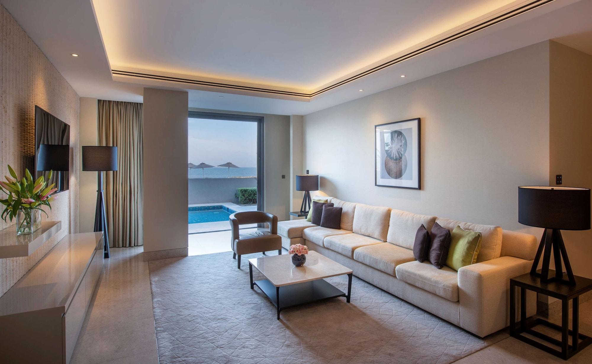 Kempinski Hotel Muscat Exterior photo A living room at the hotel
