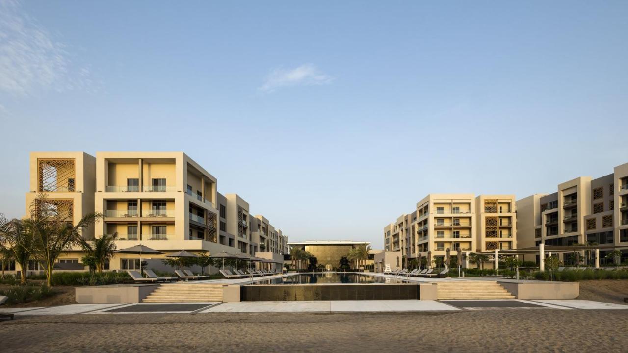 Kempinski Hotel Muscat Exterior photo Residential buildings in Al Wasl