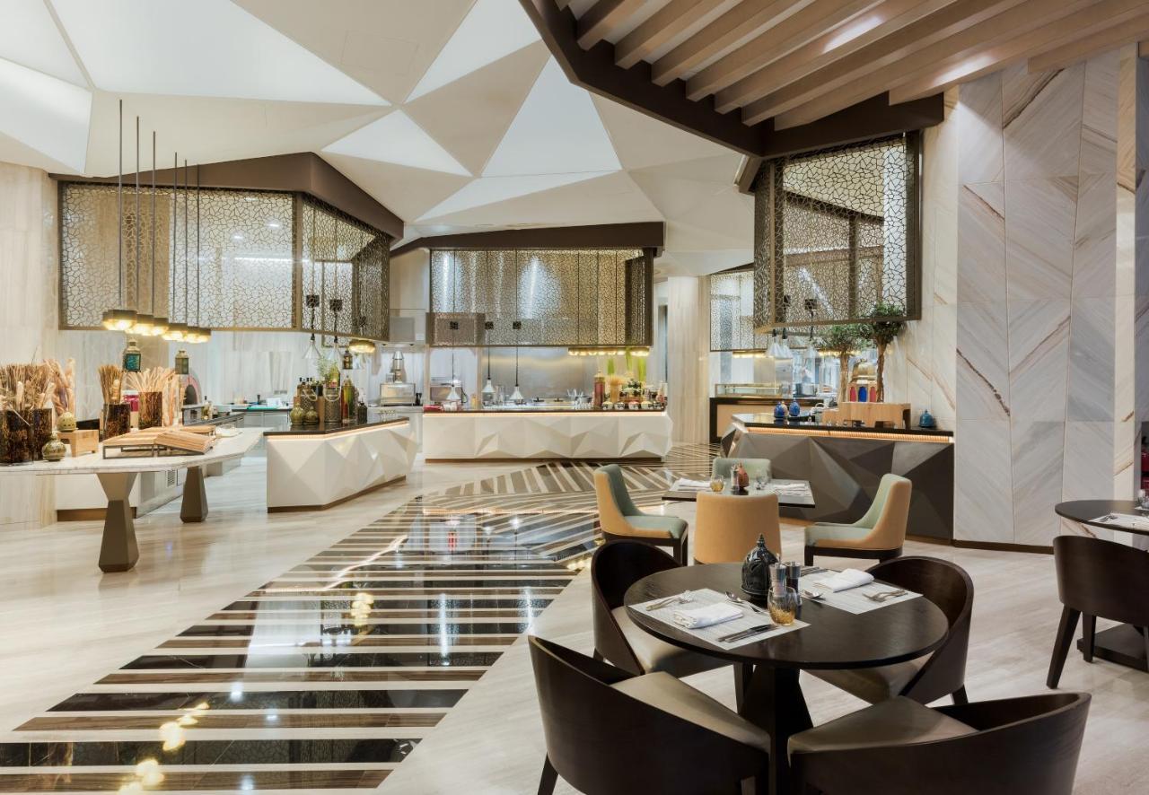 Kempinski Hotel Muscat Exterior photo The restaurant